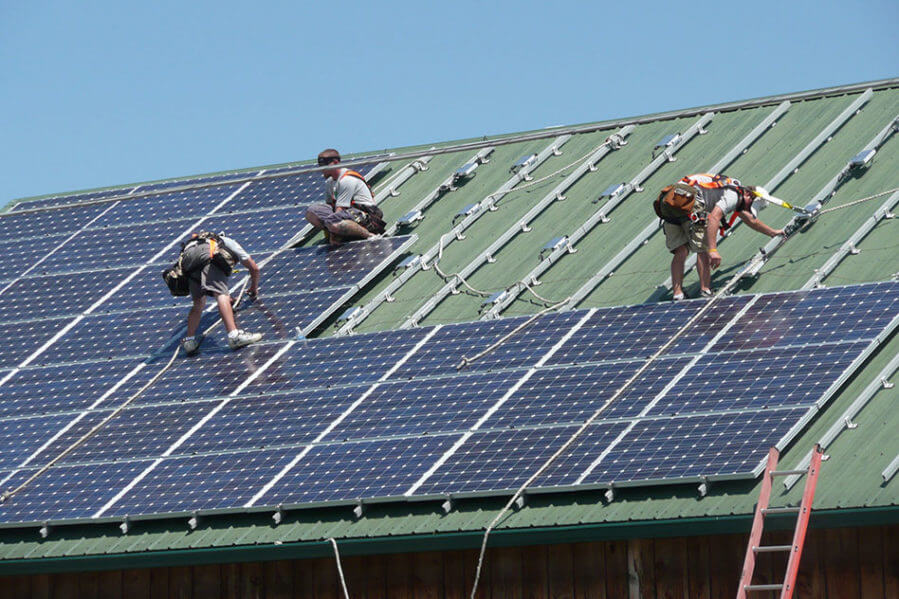 solar panels being installed