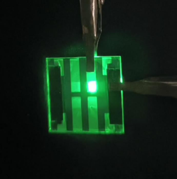 A paper-thin device uses quantum dots, similar to those described in this work, to light up LEDs.