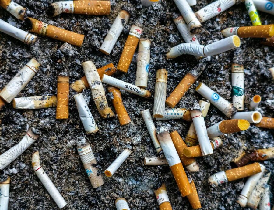 cigarette butts in sand