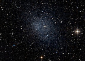 This dwarf spheroidal galaxy in the constellation Fornax is a satellite of our Milky Way and is one of 10 used in Fermi's dark matter search. The motions of the galaxy's stars indicate that it is embedded in a massive halo of matter that cannot be seen. (Credit: ESO/Digital Sky Survey 2)
