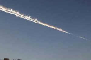meteor streaking across day sky