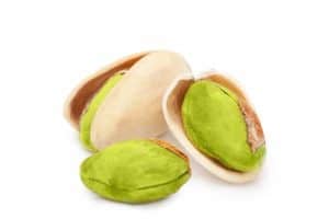 Pistachio nuts isolated on white background