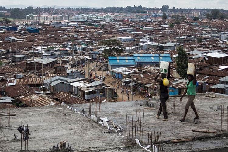 People dwelling in urban slums are uniquely vulnerable to COVID-19, but suffer under shelter-in-place restrictions that can often limit their access to basic needs like food and water. (UC Berkeley photo by Jason Corburn)