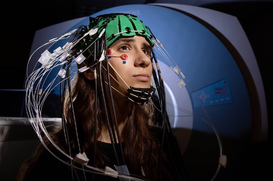 A new approach to brain imaging combines functional MRI, electroencephalography and a technique known as EROS, which shines near-infrared light on the scalp to capture brain activity. Photo by L. Brian Stauffer