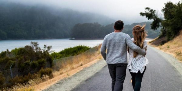 Couple walking on road