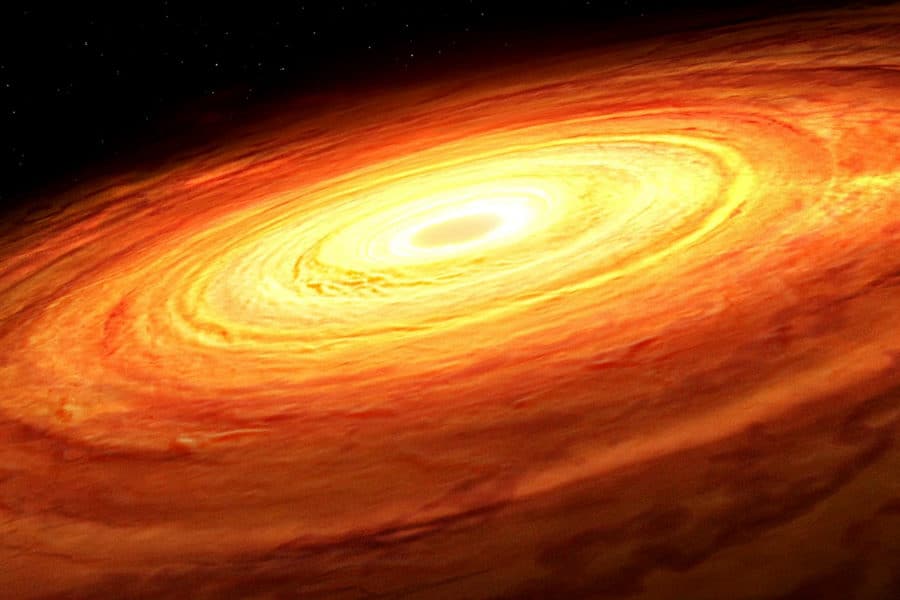 An artist’s impression of an accretion disk rotating around an unseen supermassive black hole. The accretion process produces random fluctuations in luminosity from the disk over time, a pattern found to be related to the mass of the black hole in a new study led by University of Illinois Urbana-Champaign researchers.