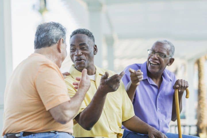 Elderly men speaking
