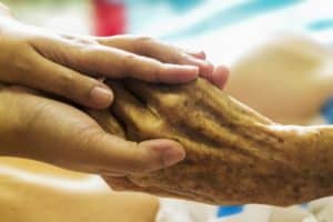 Hands of an elderly person close up.