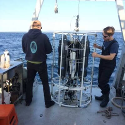 Researchers prepare to launch sampling equipment in Port Hacking, eastern Australia.