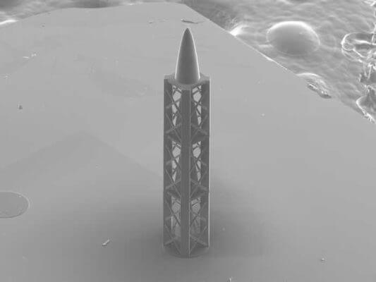 A microstructure created by a 3D printer: the innovative refractive structure developed by PSI scientists and which combined with a diffractive element, results in an achromatic X-ray lens, is almost a millimetre long (or high, as shown in the photo). Turned on its end, it resembles a miniature rocket. It was created by a 3D printer using a special type of polymer. This image of the structure was captured using a scanning electron microscope.