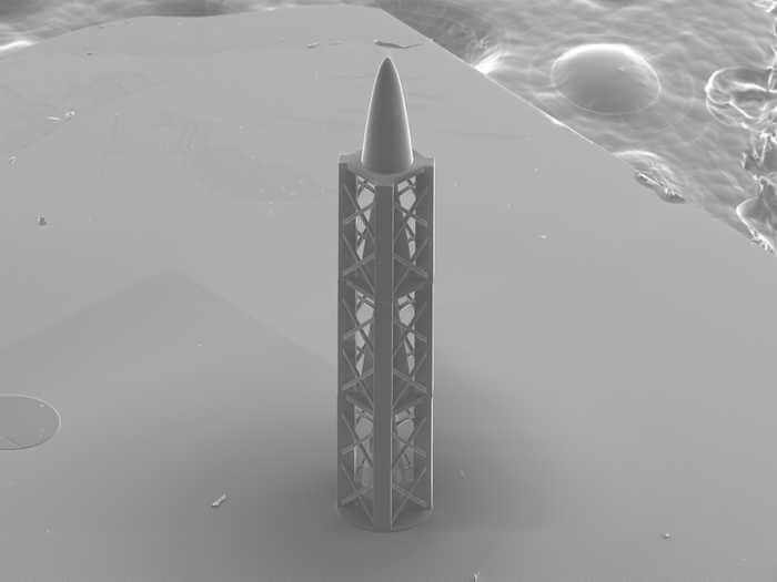 A microstructure created by a 3D printer: the innovative refractive structure developed by PSI scientists and which combined with a diffractive element, results in an achromatic X-ray lens, is almost a millimetre long (or high, as shown in the photo). Turned on its end, it resembles a miniature rocket. It was created by a 3D printer using a special type of polymer. This image of the structure was captured using a scanning electron microscope.