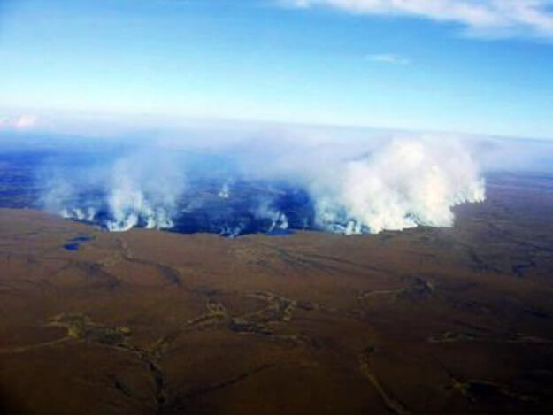 Burning more than 1,000 square kilometers of tundra on Alaska’s North Slope, the 2007 Anaktuvuk river wildfire is one of the largest fires to occur within Arctic ecosystems. Berkeley Lab scientist Nick Bouskill led a study that used data from this disturbance event to predict ecosystem recovery as fires advance in a changing climate. (Credit: Bureau of Land Management)