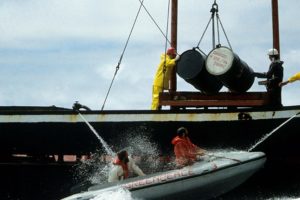 Disposal of barrels by the British vessel GEM during a Greenpeace protest in the North Atlantic in 1981.