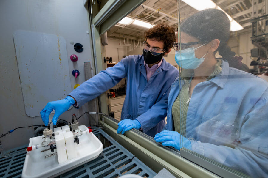Berkeley Lab researchers Andrew Haddad (left) and Emna Aidi are working on a new approach for direct air capture of carbon dioxide. (Credit: Thor Swift/Berkeley Lab)