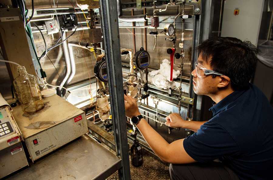 A Pacific Northwest National Laboratory scientist at Richland, Wash., helps develop a sustainable fuel component as part of research into bio-based jet fuels.