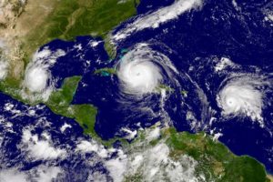 A satellite image from the National Oceanic and Atmospheric Administration captures an active hurricane season which included Hurricanes Katia and Irma and Tropical Storm Jose (from left to right) on September 8, 2017