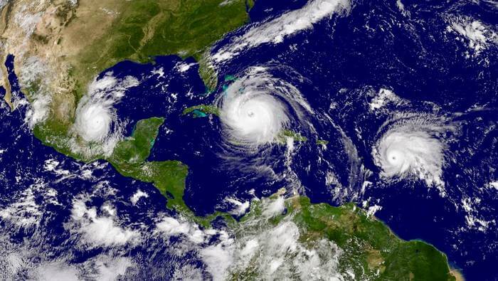 A satellite image from the National Oceanic and Atmospheric Administration captures an active hurricane season which included Hurricanes Katia and Irma and Tropical Storm Jose (from left to right) on September 8, 2017
