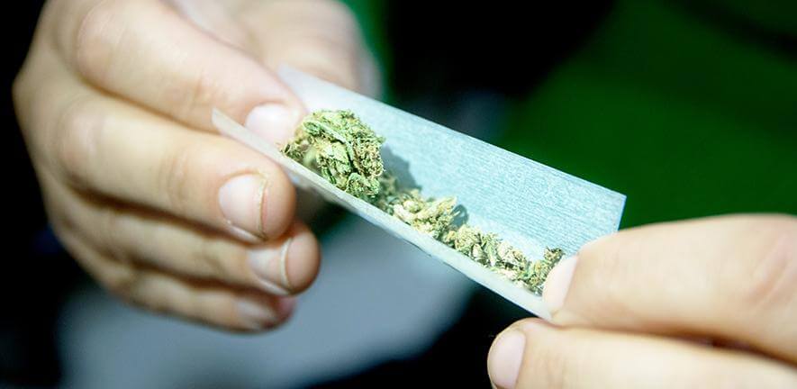 Female hands rolling a marijuana joint Credit: jopstock (Getty Images)