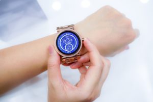 Close-up of a smartwatch on a woman's wrist