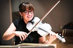 Woman playing a printed violin