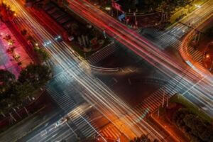 Artistic overhead view of an intersection of streets at night