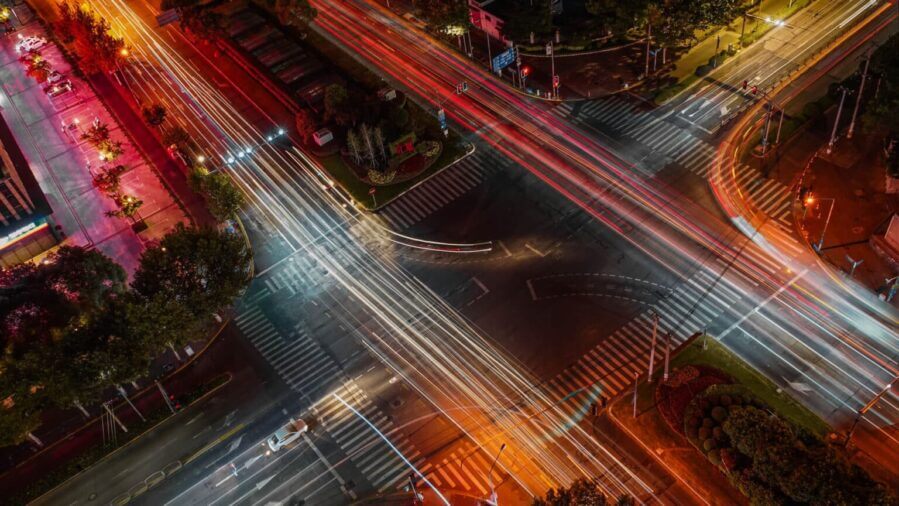 Artistic overhead view of an intersection of streets at night