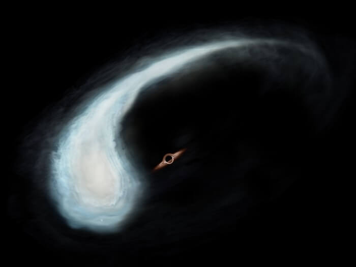 Artist’s Impression of the “Tadpole” Molecular Cloud and the black hole at the gravitational center of its orbit.