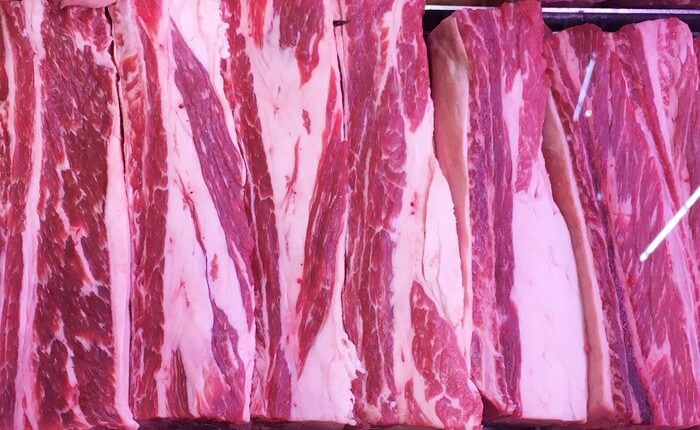 Fat contributes texture and distinct flavor to farm raised beef (shown here) and other meats. Researchers have replicated the texture and composition of natural fat in fat tissue grown from cells.