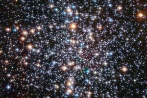A Hubble Space Telescope image of the globular star cluster, Messier 4. The cluster is a dense collection of several hundred thousand stars. Astronomers suspect that an intermediate-mass black hole, weighing as much as 800 times the mass of our Sun, is lurking, unseen, at its core. Credits: ESA/Hubble, NASA