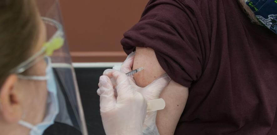Patient receiving a COVID-19 vaccination in their arm Credit: Steven Cornfield