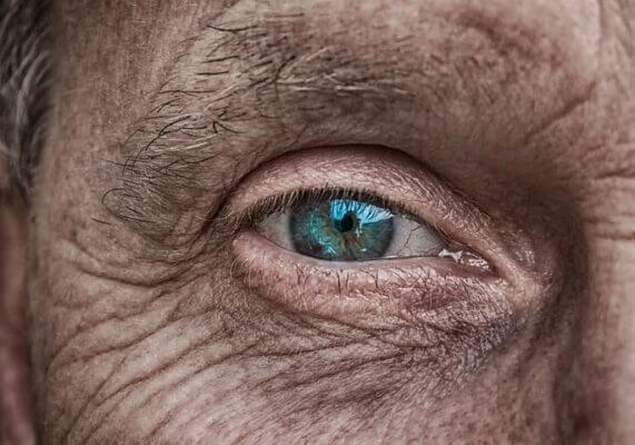 Closeup of an el man's blue eye