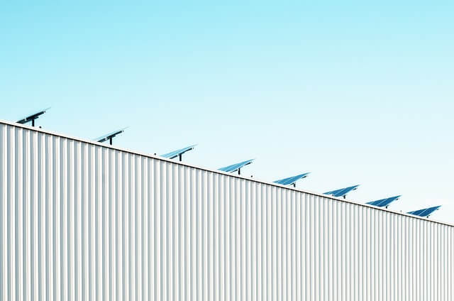 Solar panels on an industrial rooftop
