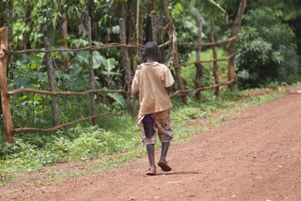 Child walking down road in Africa. Pixabay