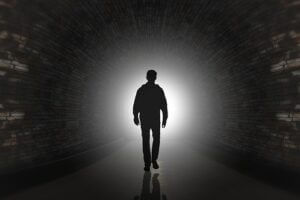 Man in mysterious tunnel. Pixabay.