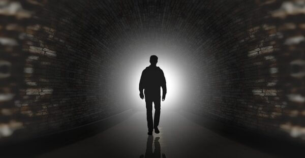 Man in mysterious tunnel. Pixabay.