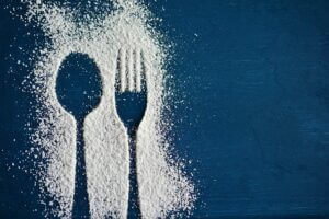 Sugar illustration showing outline of a spoon and fork. Pixabay.