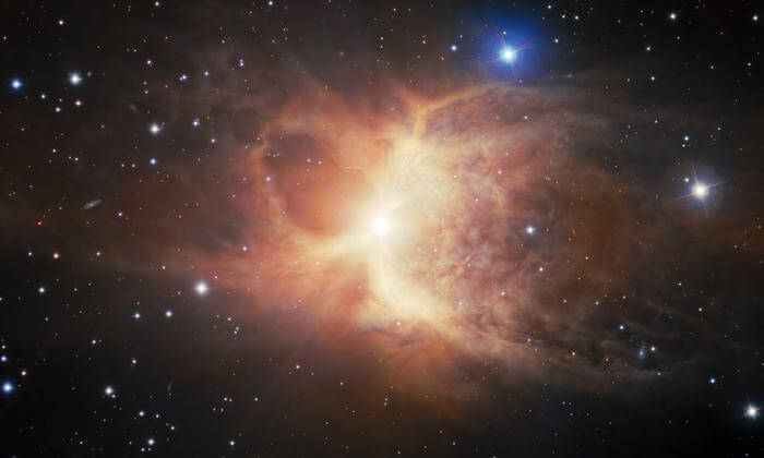 A billowing pair of nearly symmetrical loops of dust and gas mark the death throes of an ancient red-giant star, as captured by Gemini South, one half of the International Gemini Observatory, operated by NSF’s NOIRLab. The resulting structure, said to resemble an old style of English jug, is a rarely seen bipolar reflection nebula. Evidence suggests that this object formed by the interactions between the dying red giant and a now-shredded companion star. The image was obtained by NOIRLab’s Communication, Education & Engagement team as part of the NOIRLab Legacy Imaging Program.