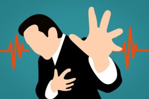 Illustration of a man having a heart attack. Pixabay