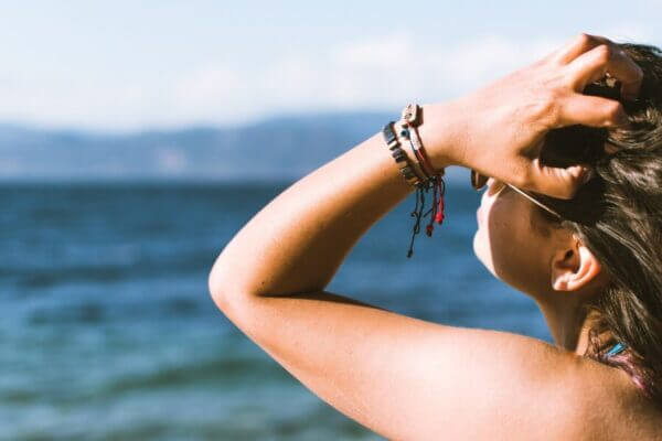 Suntanners be warned: Short, intense sun-seeking trips can disrupt skin’s microbiome