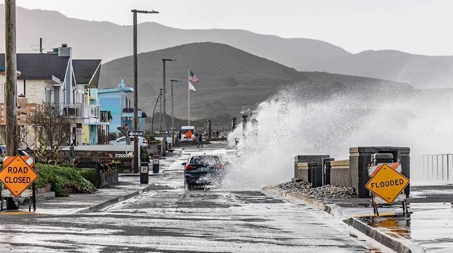 Credit: Jason Doiy/iStock Storm waves lash city streets in Pacifica, Calif., Jan. 6, 2023.
