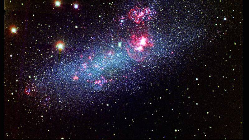 University of Michigan astronomer Sally Oey studied a star-forming region in host galaxy, NGC 2366, which is a typical dwarf irregular galaxy. Image courtesy: Observatorio de Calar Alto, J. van Eymeren (AIRUB, ATNF) & Á.R. López-Sánchez