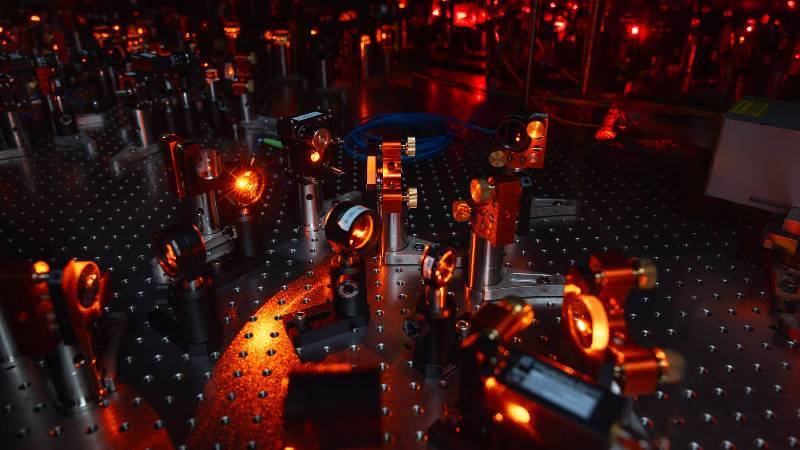 Laser setup for cooling, controlling, and entangling individual molecules. Photo by Richard Soden, Department of Physics
