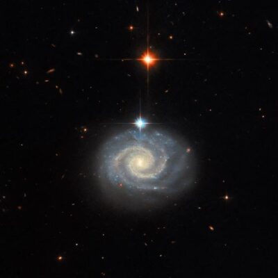 This NASA Hubble Space Telescope image features a bright spiral galaxy known as MCG-01-24-0...                    </div>

                    <div class=