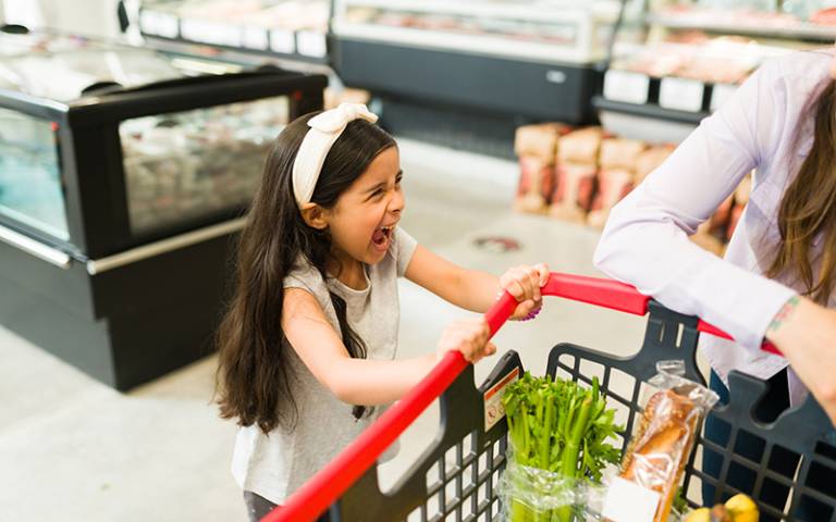 screaming girl in a grocery store