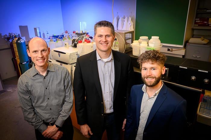 Professors Erik Nelson, left, Kelly Swanson, and Brett Loman, far right, joined together on research using a mouse study on the gut microbiome and female sex hormones and their roles in metabolic dysfunction in postmenopausal women. Photo taken at the University of Illinois Urbana-Champaign on Tuesday, Jan. 23, 2024. (Photo by Fred Zwicky / University of Illinois Urbana-Champaign)