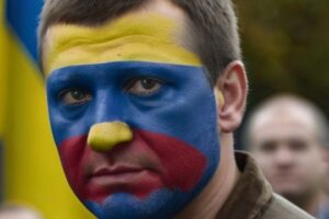 Man with face painted in colors of Ukrainian flag