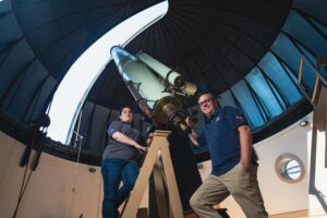 University of Cincinnati graduate student Andrea Corpolongo, left, and Associate Professor Andy Czaja pose in front of a telescope at the Cincinnati Observatory. They serve on the NASA science team exploring Mars with the Perseverance rover.