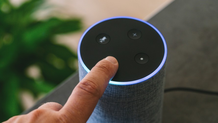 Ai speaker with finger hitting the off button