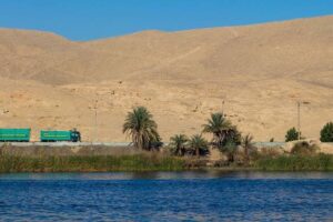 Nile river with water trucks