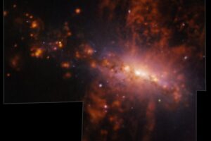 Galaxy NGC 4383 evolving strangely. Gas is flowing from its core at a rate of over 200 km/s. This mysterious gas eruption has a unique cause: star formation.